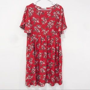 Orange red floral dress.